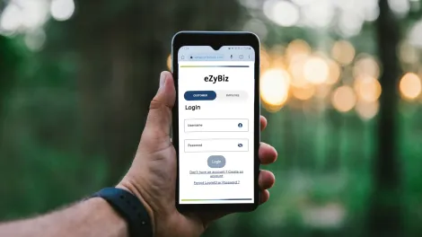 Mobile Phone with Holcim Australia eZyBiz Portal